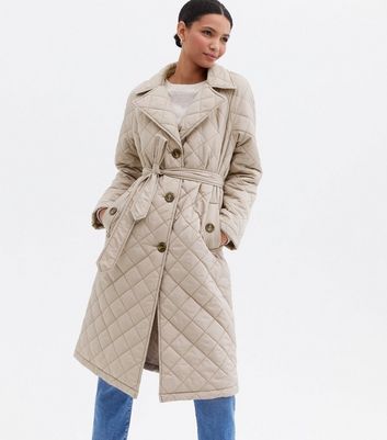 belted cream coat