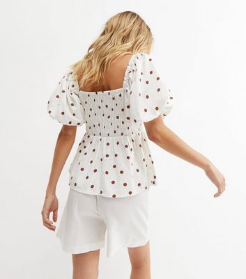 Click to view product details and reviews for White Spot Linen Look Shirred Peplum Blouse New Look.