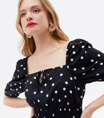 Click to view product details and reviews for Black Spot Shirred Waist Peplum Blouse New Look.