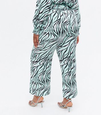 Click to view product details and reviews for Curves Blue Zebra Print Satin Wide Leg Trousers New Look.