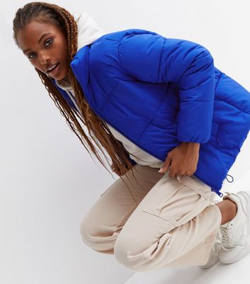 neon blue puffer jacket