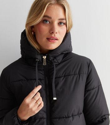 womens black puffer coat mid length