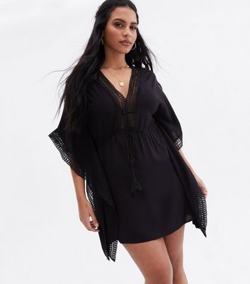 Black caftan cover sales up