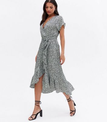 Click to view product details and reviews for Green Animal Print Satin Ruffle Midi Wrap Dress New Look.