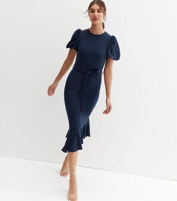 Click to view product details and reviews for Navy Scuba Crepe Puff Sleeve Belted Midi Dress New Look.