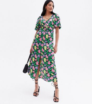 Click to view product details and reviews for Black Floral Ruched Puff Sleeve Midi Dress New Look.