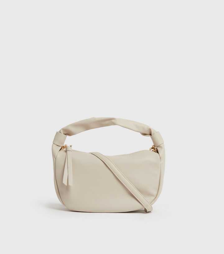 Worth the Tassel Crossbody Cream