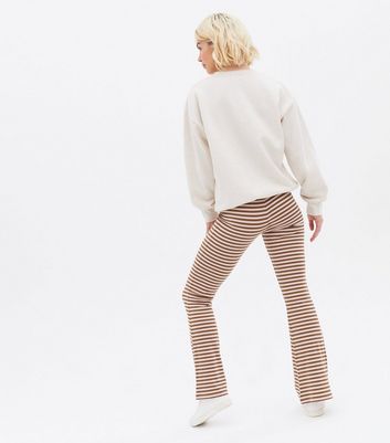 Click to view product details and reviews for Brown Stripe Ribbed Flared Trousers New Look.