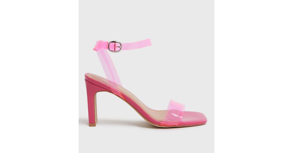 neon pink perspex heels