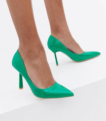 green patent pumps