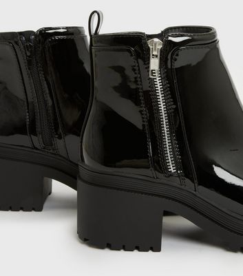 Black patent outlet zip front boots