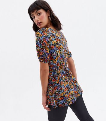 Click to view product details and reviews for Black Floral Cut Out Puff Sleeve Peplum Top New Look.