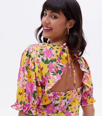 Click to view product details and reviews for Pink Floral Crepe Open Back Midi Wrap Dress New Look.