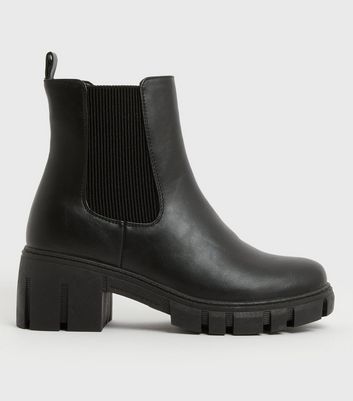 Cilla Patent Mid Heel Boot in PURE BLACK | White Stuff