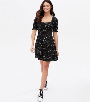 Click to view product details and reviews for Black Spot Crinkle Jersey Ruched Mini Dress New Look.