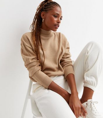 Camel high clearance neck top