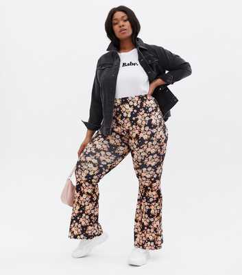 Curves Black Floral Ribbed Flared Trousers