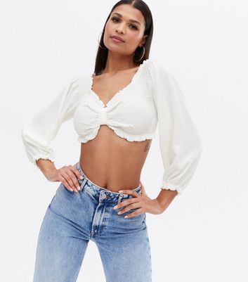 Click to view product details and reviews for Pink Vanilla Off White Shirred Puff Sleeve Crop Top New Look.