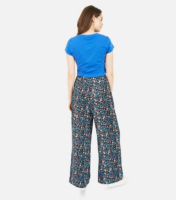 Click to view product details and reviews for Yumi Blue Floral Wide Leg Trousers New Look.
