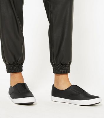 black faux snake slip on trainers