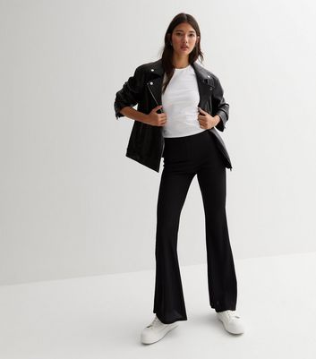 Click to view product details and reviews for Black Ribbed Jersey High Waist Flared Trousers New Look.