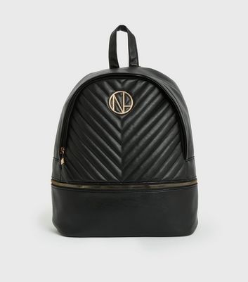 Black quilted rucksack online