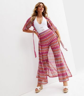 Click to view product details and reviews for Jetsetter Pink Zig Zag Fine Knit Flared Trousers New Look.