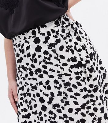 Click to view product details and reviews for Curves White Animal Print Midi Wrap Skirt New Look.