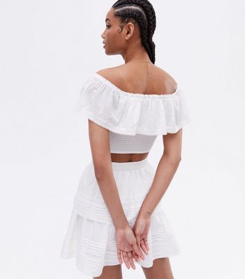 White bardot ruffle store top