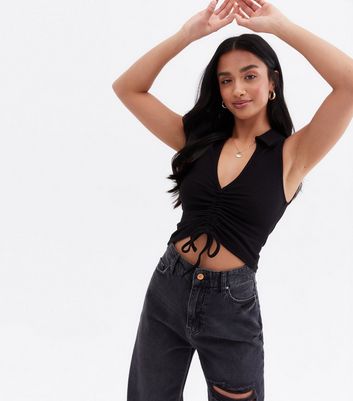 Click to view product details and reviews for Petite Black Ruched Front Collared Crop Top New Look.