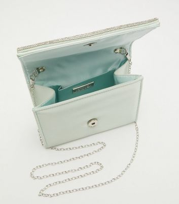 New look green online clutch bag