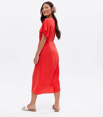 Click to view product details and reviews for Petite Red Button Front Midi Dress New Look.
