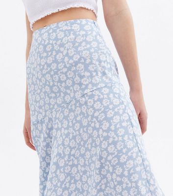 long blue floral skirt