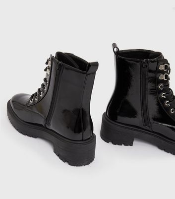 Black shiny shop biker boots