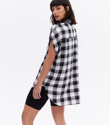 Click to view product details and reviews for White Check Short Sleeve Oversized Shirt New Look.