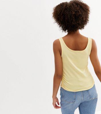 Teenager Bekleidung für Mädchen Girls Yellow Butterfly Be Kind Logo Vest