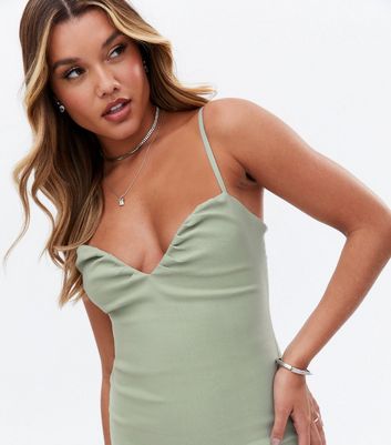 Click to view product details and reviews for Pink Vanilla Light Green Notch Front Mini Bodycon Dress New Look.