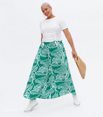 Click to view product details and reviews for Blue Vanilla Curves Green Tropical Shirred Crop Trousers New Look.