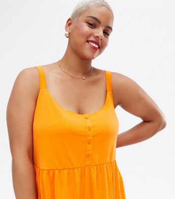 Click to view product details and reviews for Vero Moda Curves Bright Orange Tiered Smock Dress New Look.