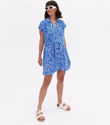 Click to view product details and reviews for Blue Tiger Print Button Front Smock Shirt Dress New Look.