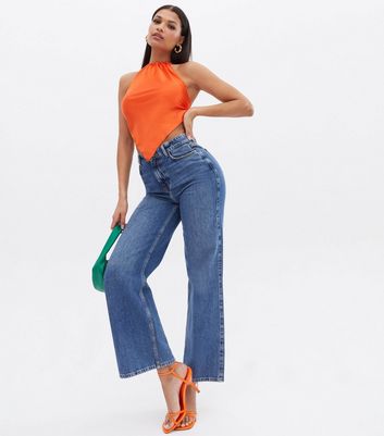 Click to view product details and reviews for Bright Orange Satin Hanky Hem Halter Neck Top New Look.