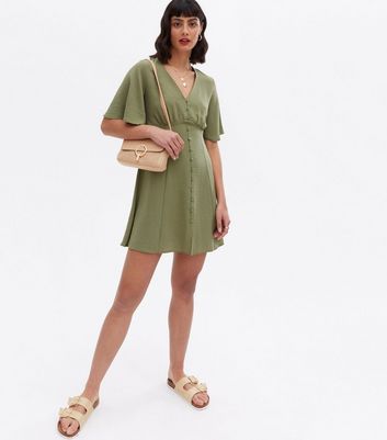 Click to view product details and reviews for Khaki Button Front Flutter Sleeve Mini Dress New Look.