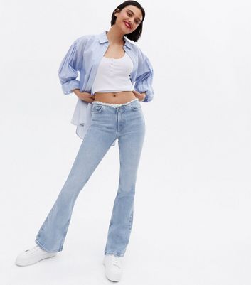 Click to view product details and reviews for Blue Cut Off Frayed Low Rise Flared Brooke Jeans New Look.