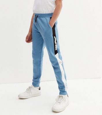 Blue joggers white discount stripe