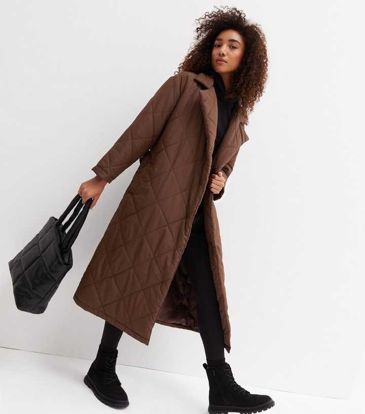 quilted belted longline puffer coat