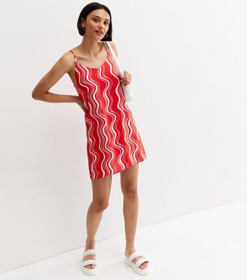 Click to view product details and reviews for Red Swirl Strappy Mini Slip Dress New Look.