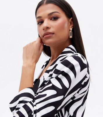 Click to view product details and reviews for Cameo Rose Black Wavy Oversized Blazer New Look.