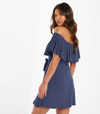 Click to view product details and reviews for Quiz Navy Spot Bardot Mini Skater Dress New Look.