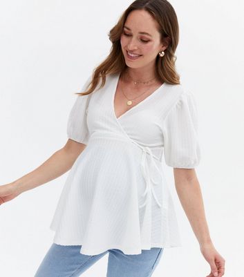 Click to view product details and reviews for Maternity Off White Textured Wrap Peplum Top New Look.