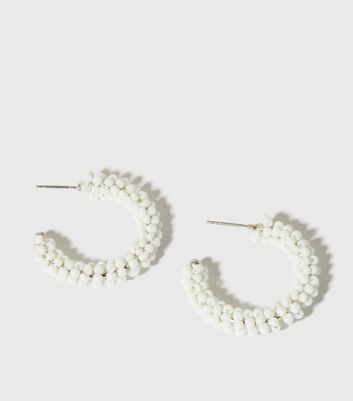 white beaded hoops